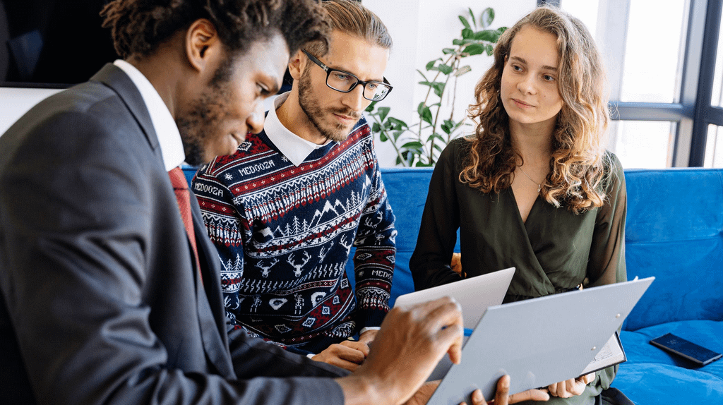 three people talking